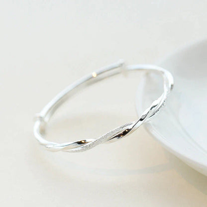 Giselle | Twisted Silver Bangle Bracelet – Elegant, Minimalist & Timeless