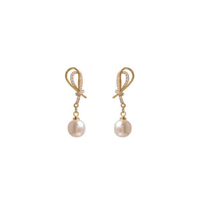 Nova | Golden Shell Pearl Knot Dangling Earrings – Sparkling & Elegant Jewelry for Women